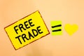 Conceptual hand writing showing Free Trade. Business photo text The ability to buy and sell on your own terms and means Yellow pap