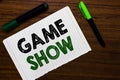 Conceptual hand writing showing Game Show. Business photo text Program in television or radio with players that win prizes Noteboo