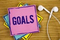 Conceptual hand writing showing Goals. Business photo showcasing Desired Achievements Targets What you want to accomplish in the f Royalty Free Stock Photo