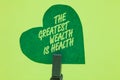 Conceptual hand writing showing The Greatest Wealth Is Health. Business photo showcasing being in good health is the prize Take ca Royalty Free Stock Photo