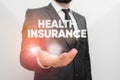 Conceptual hand writing showing Health Insurance. Business photo text reimburse the insured for expenses incurred from