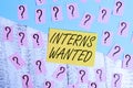 Conceptual hand writing showing Interns Wanted. Business photo text temporary position with an emphasis on the job training Royalty Free Stock Photo