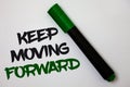 Conceptual hand writing showing Keep Moving Forward. Business photo text improvement Career encouraging Go ahead be better White b