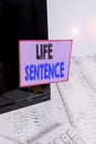 Conceptual hand writing showing Life Sentence. Business photo text the punishment of being put in prison for a very long time