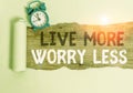 Conceptual hand writing showing Live More Worry Less. Business photo text Have a good attitude motivation be careless enjoy life Royalty Free Stock Photo