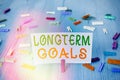 Conceptual hand writing showing Longterm Goals. Business photo text Strategic target that is required more time for completion