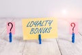 Conceptual hand writing showing Loyalty Bonus. Business photo text reward such as money or points is given for a loyal customer