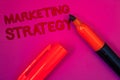 Conceptual hand writing showing Marketing Strategy. Business photo text Plan Formula Creativity Research Organization Magenta colo Royalty Free Stock Photo