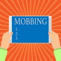 Conceptual hand writing showing Mobbing. Business photo showcasing Bulling of individual specially at work Emotional