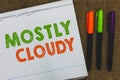Conceptual hand writing showing Mostly Cloudy. Business photo text Shadowy Vaporous Foggy Fluffy Nebulous Clouds Skyscape Open not