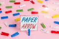 Conceptual hand writing showing Paper Arrow. Business photo showcasing Business infographic use to show direction or movement