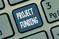 Conceptual hand writing showing Project Funding. Business photo showcasing paying for start up in order make it bigger