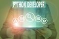 Conceptual hand writing showing Python Developer. Business photo showcasing responsible for writing serverside web Royalty Free Stock Photo