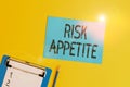 Conceptual hand writing showing Risk Appetite. Business photo text the level of risk an organization is prepared to accept