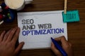 Conceptual hand writing showing Seo And Web Optimization. Business photo showcasing Search Engine Keywording Marketing Strategies