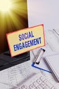 Conceptual hand writing showing Social Engagement. Business photo text Degree of engagement in an online community or society Note