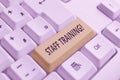 Conceptual hand writing showing Staff Training. Business photo showcasing learn specific knowledge improve Royalty Free Stock Photo