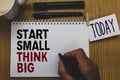 Conceptual hand writing showing Start Small Think Big. Business photo text Initiate with few things have something great in mind W Royalty Free Stock Photo