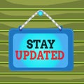 Conceptual hand writing showing Stay Updated. Business photo showcasing keep modern recent or containing the latest information