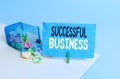 Conceptual hand writing showing Successful Business. Business photo showcasing Achievement of goals within a specified