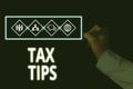 Conceptual hand writing showing Tax Tips. Business photo showcasing compulsory contribution to state revenue levied by Royalty Free Stock Photo