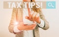 Conceptual hand writing showing Tax Tips. Business photo showcasing compulsory contribution to state revenue levied by government Royalty Free Stock Photo