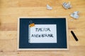 Conceptual hand writing showing Time For A New Normal, on white paperclip hold written chalkboard on wooden deck