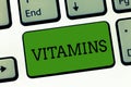 Conceptual hand writing showing Vitamins. Business photo showcasing group of organic compounds which are essential for