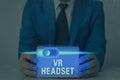 Conceptual hand writing showing Vr Headset. Business photo showcasing headmounted device that provides virtual reality for the