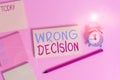 Conceptual hand writing showing Wrong Decision. Business photo showcasing Action or conduct inflicting harm without due