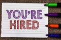 Conceptual hand writing showing You re are Hired. Business photo showcasing New Job Employed Newbie Enlisted Accepted Recruited No