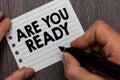 Conceptual hand writing showing Are You Ready. Business photo showcasing Alertness Preparedness Urgency Game Start Hurry Wide awak Royalty Free Stock Photo