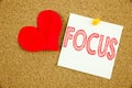 Conceptual hand writing text caption inspiration showing Focus concept for Attention Success Concentrate and Love written on stick Royalty Free Stock Photo