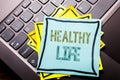 Conceptual hand writing text caption inspiration showing Healthy Life. Business concept for Good Health Food written on sticky not Royalty Free Stock Photo