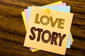 Conceptual hand writing text caption inspiration showing Love Story. Business concept for Loving Someone Heart written on sticky Royalty Free Stock Photo