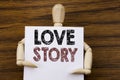 Conceptual hand writing text caption inspiration showing Love Story. Business concept for Loving Someone Heart written on sticky Royalty Free Stock Photo