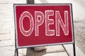 Conceptual hand writing text caption inspiration showing Open. Business concept for shop Opening written on announcement road sign Royalty Free Stock Photo