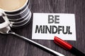Conceptual hand writing text caption showing Be Mindful. Business concept for Mindfulness Healthy Spirit written on sticky note pa Royalty Free Stock Photo