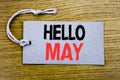 Conceptual hand writing text caption showing Hello May Month. Business concept for Coming Spring Month written on price tag paper Royalty Free Stock Photo