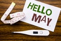 Conceptual hand writing text caption showing Hello May Month. Business concept for Coming Spring Month written on sticky note pape