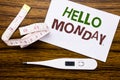 Conceptual hand writing text caption showing Hello Monday. Business concept for Day Week Start written on sticky note paper on woo