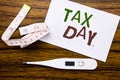 Conceptual hand writing text caption showing Tax Day. Business concept for Income taxation Refund written on sticky note paper on Royalty Free Stock Photo