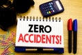 Conceptual hand writing text caption showing Zero Accidents. Business concept for Safety At Work Hazard written on notebook book o