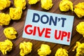 Conceptual hand writing text inspiration showing Don t Give Up. Business concept for Motivation Determination, written on sticky n Royalty Free Stock Photo