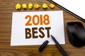 Conceptual hand writing text showing 2018 Best. Business concept for Choice Review written on sticky note paper on the wooden back Royalty Free Stock Photo