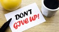 Conceptual hand writing text showing Don t Give Up. Business concept for Motivation Determination, written sticky note empty paper Royalty Free Stock Photo