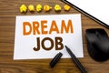 Conceptual hand writing text showing Dream Job. Business concept for Dreaming About Career written on sticky note paper on the woo Royalty Free Stock Photo