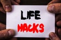 Conceptual hand writing text showing Life Hacks. Concept meaning Solution Hacking Hack Trick To Help Efficiency written on Sticky Royalty Free Stock Photo