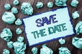 Conceptual hand writing text showing Save The Date. Concept meaning Wedding Anniversary Invitation Reminder written on Sticky note