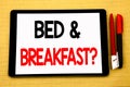 Conceptual handwriting text caption inspiration showing Bed Breakfast. Business concept for Holiday Journey Travel Written on tab